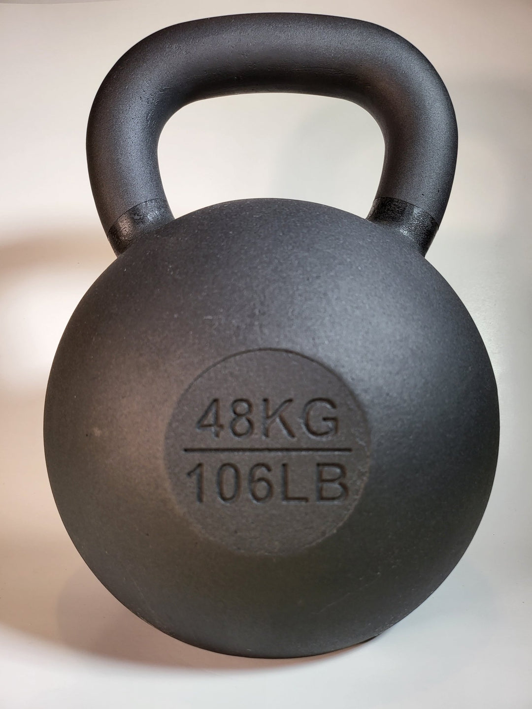 48 kg (106 lb) Powder-Coated Cast-Iron Kettlebell – Black | SoCal